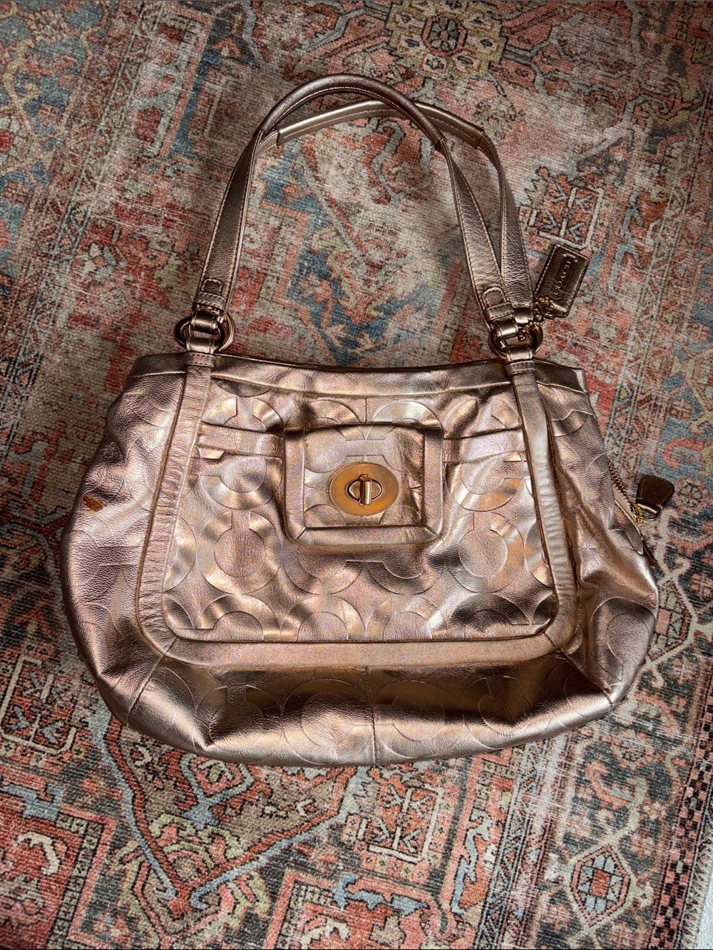 Coach Metallic Rose Gold Leather Bag with Turnlock Closure